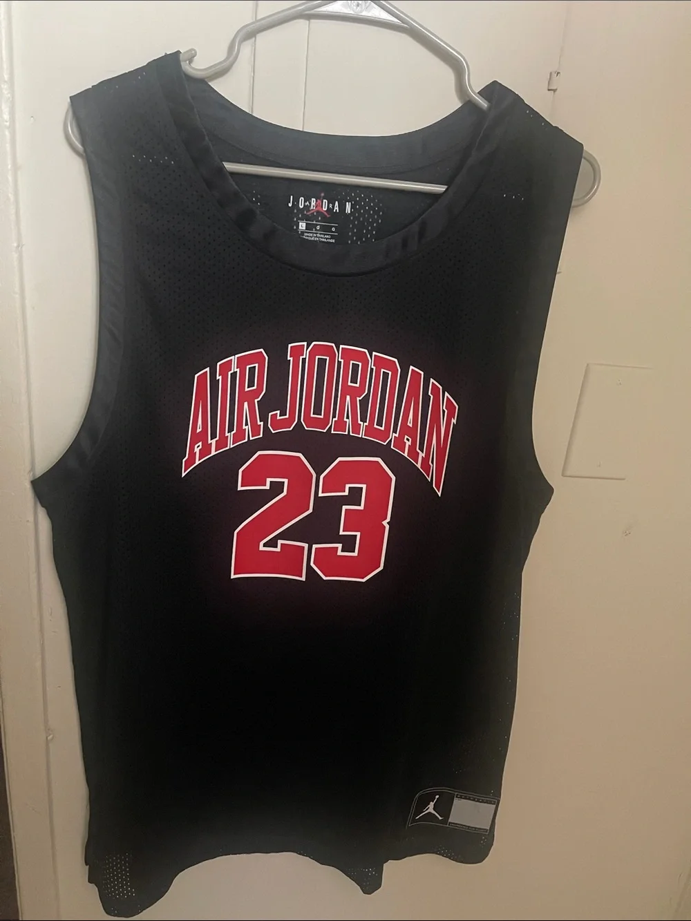 Jordan Black Mesh Basketball Jersey with Red Accents